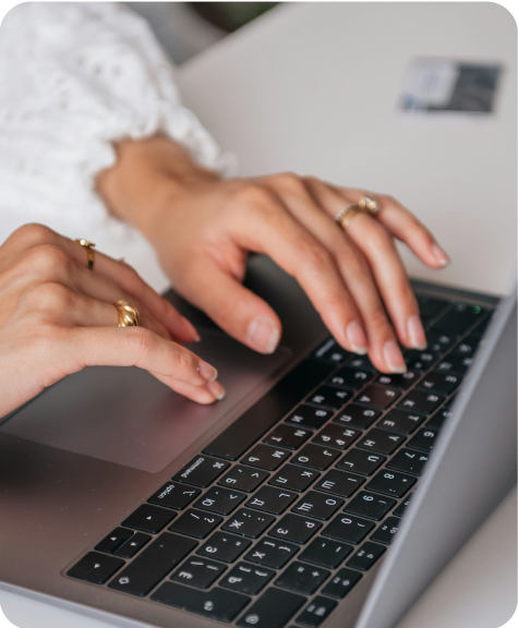 BRI_Resizingforblogs-39 Close up of a woman typing at a laptop.