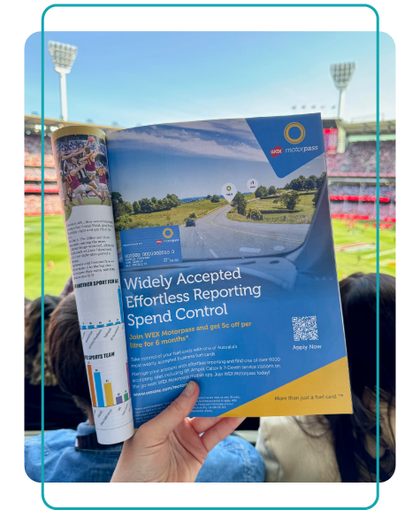 A full page ad for WEX Motorpass in The Record at an AFL grand final in Melbourne, Australia.