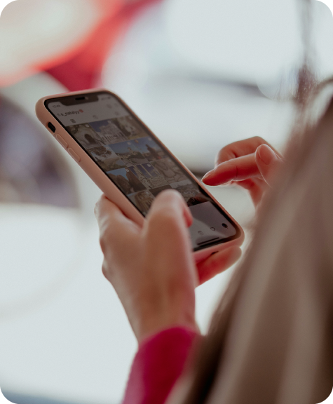 BRI_Blogresizing2_Brand-12 Person holding a mobile phone with social media page